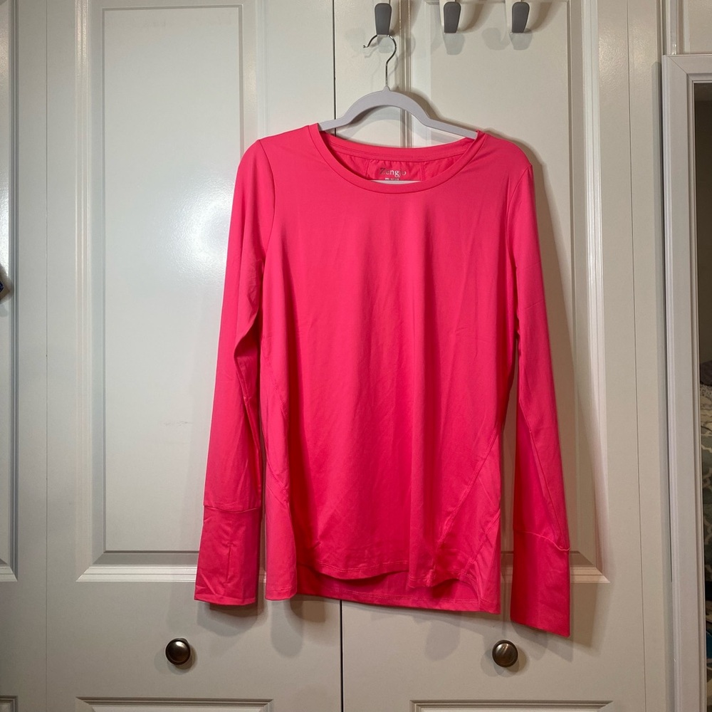Bright pink exercise thumbslit the sleeves